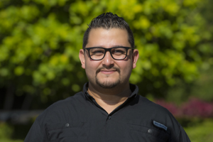 Staff member CHRISTOPHER GUZMÁN